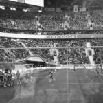 Community Sports - Stadium players celebrating goal during football match
